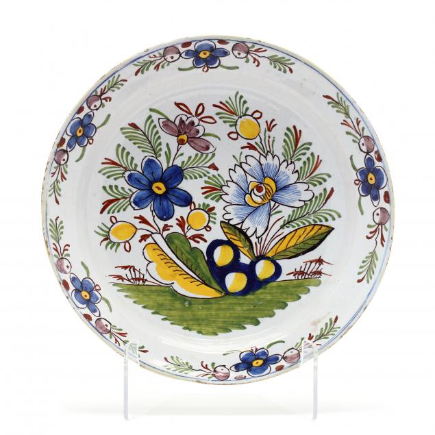 an-english-delft-polychrome-charger