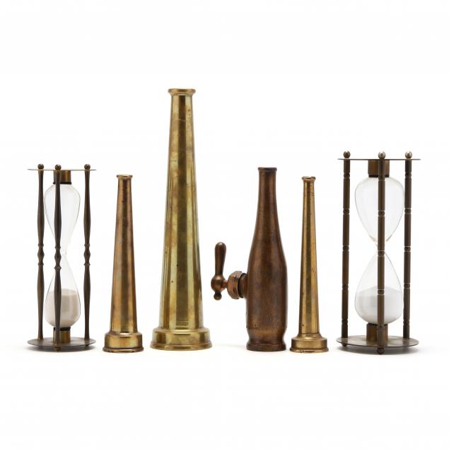 group-of-brass-fire-nozzles-and-hourglasses
