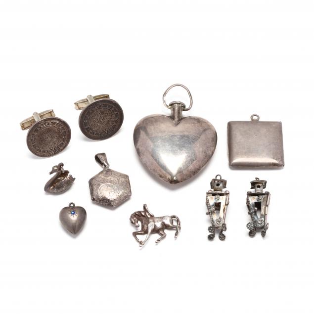 group-of-silver-pendants-and-a-pair-of-cufflinks