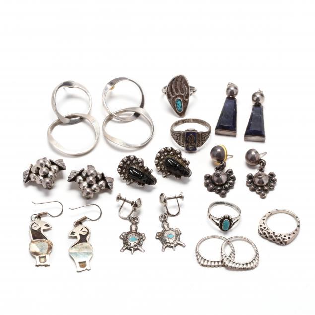 group-of-silver-earrings-and-rings