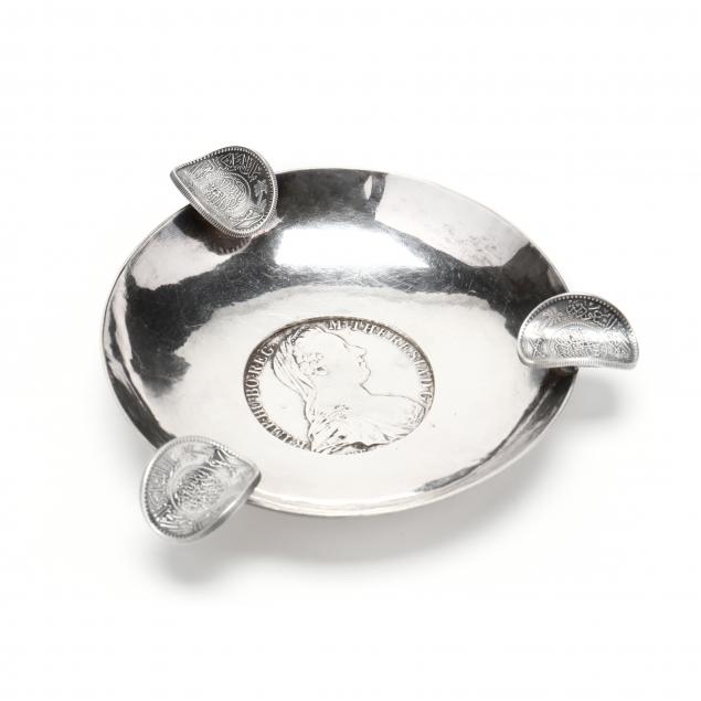 a-silver-ashtray-with-inset-coins