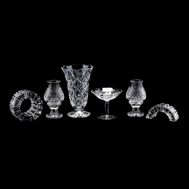 a-grouping-of-six-cut-crystal-accessories