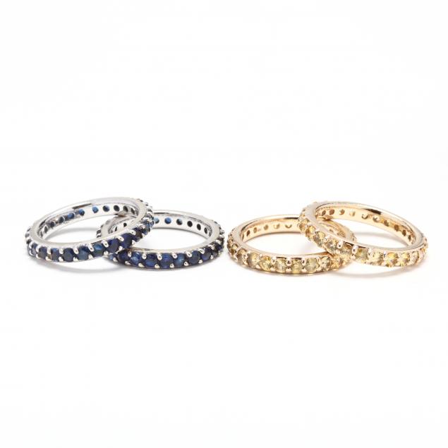 two-pairs-of-14kt-gold-and-sapphire-eternity-bands