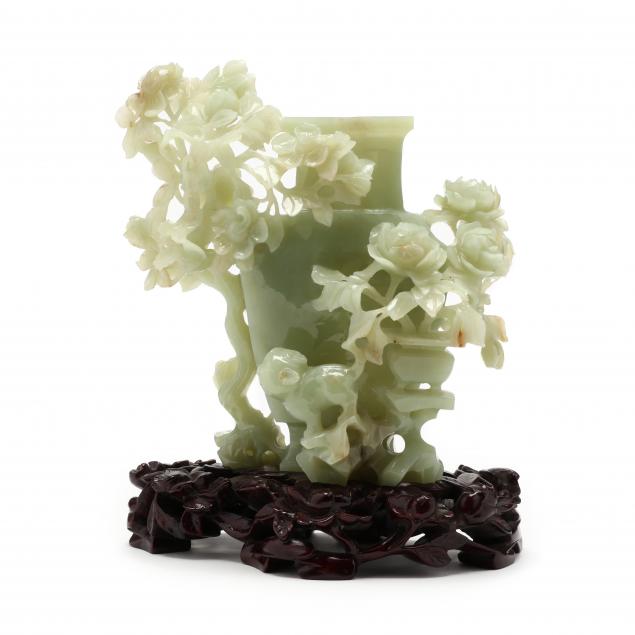 a-chinese-carved-hardstone-vase-on-stand