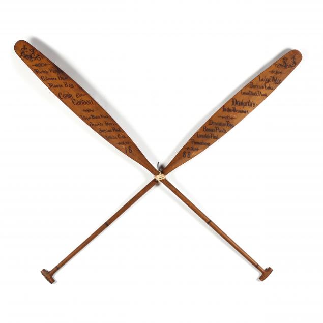 an-antique-crossed-pair-of-large-wooden-trophy-oars