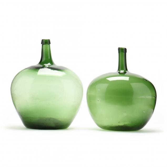 two-large-green-glass-demijohn-storage-bottles