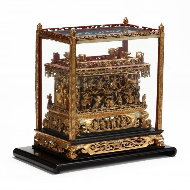 a-chinese-lacquered-and-gilt-coffer
