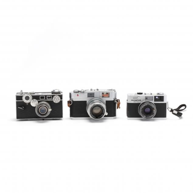 three-vintage-cameras