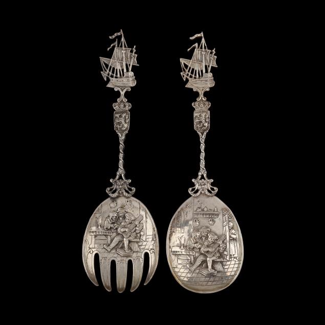 a-pair-of-figural-german-hanau-silver-serving-pieces