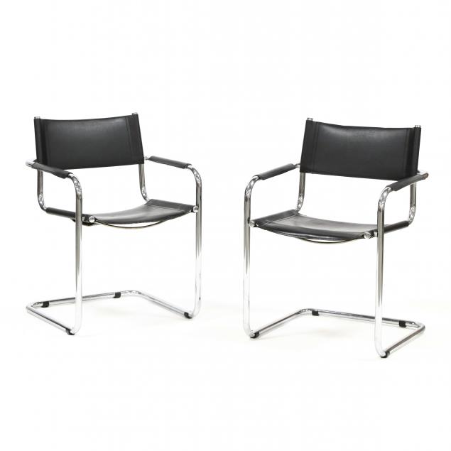 pair-of-chrome-and-leather-armchairs