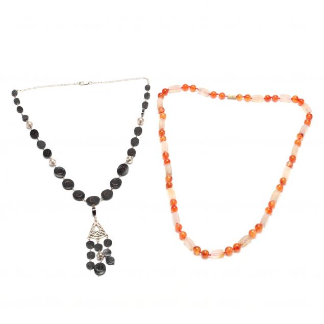 a-carnelian-and-chalcedony-necklace-and-a-silver-and-black-coral-necklace