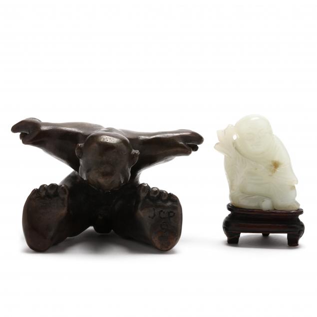 two-small-figural-sculptures