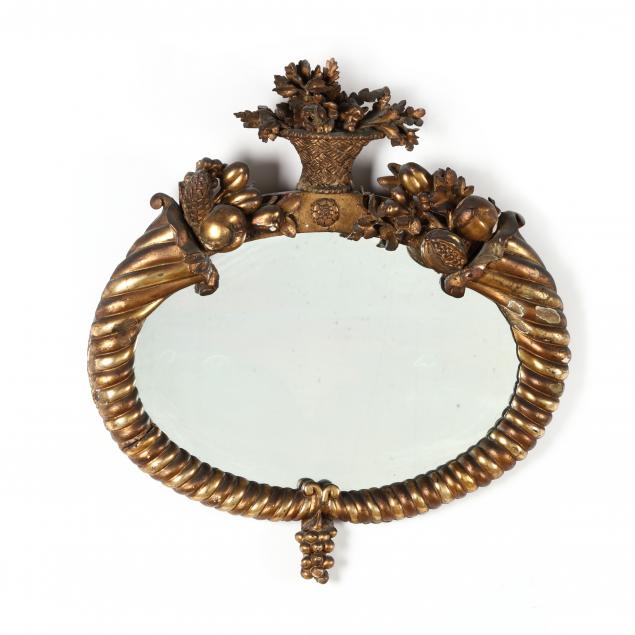 antique-carved-and-gilt-oval-mirror