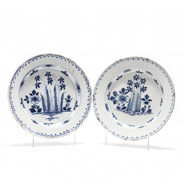 a-pair-of-english-delft-blue-and-white-chargers