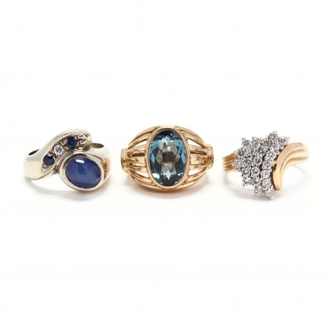 three-gold-and-gem-set-rings