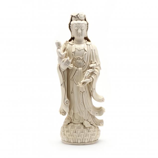 a-large-blanc-de-chine-porcelain-guanyin-with-child