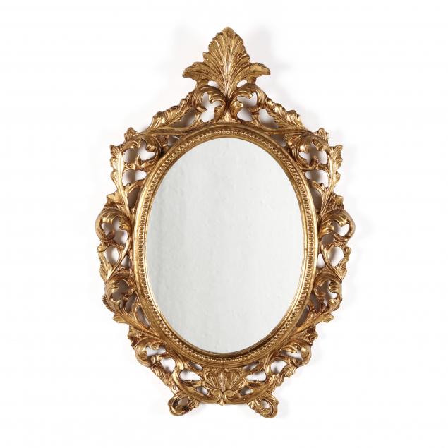 a-diminutive-italian-carved-and-gilt-mirror