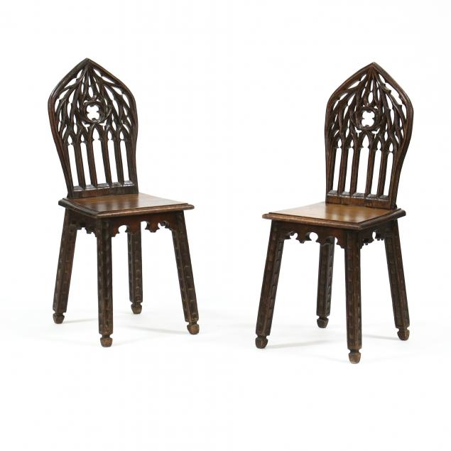 pair-of-gothic-revival-carved-oak-plank-seat-chairs