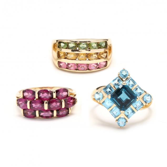 three-gold-and-gem-set-rings