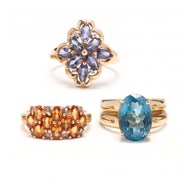 three-gold-and-gem-set-rings