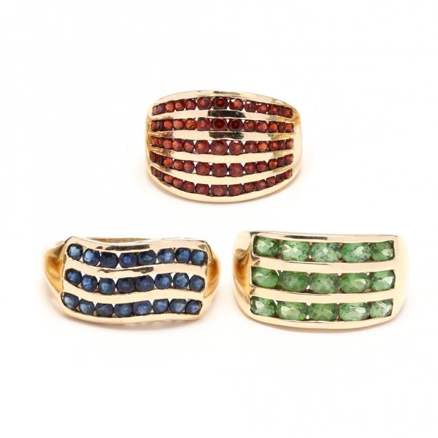three-gold-and-gem-set-rings