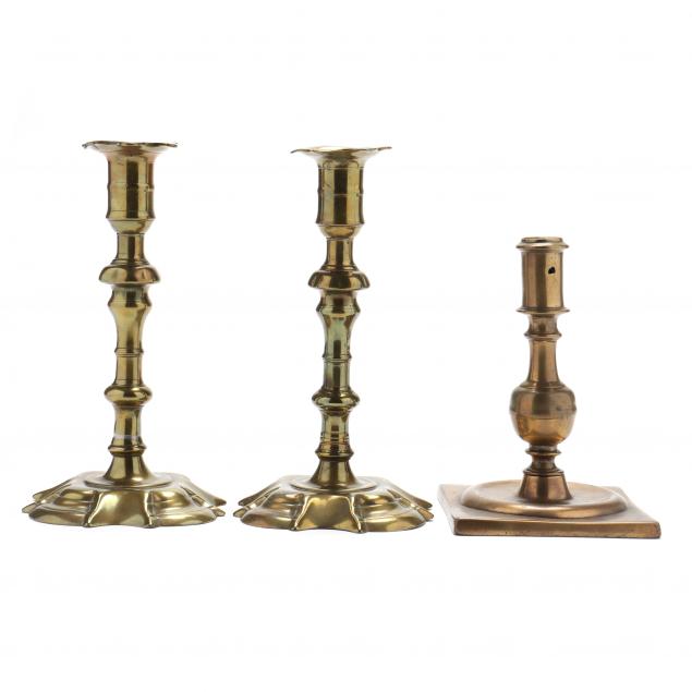 three-eighteenth-century-brass-candlesticks