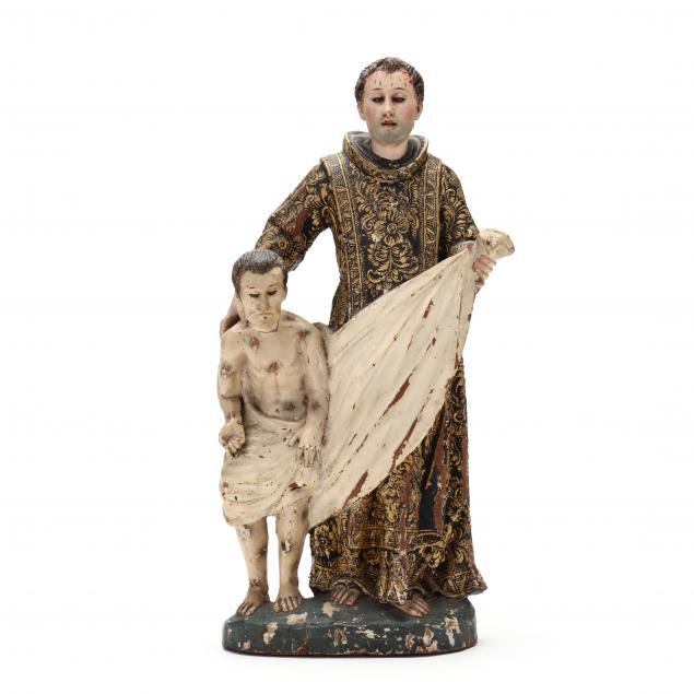 a-spanish-colonial-santos-figural-of-a-saint-tending-the-afflicted