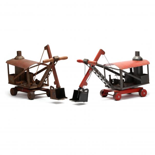 three-similar-keystone-riding-steam-shovel-toys