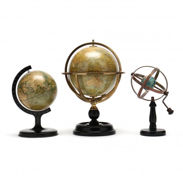 three-vintage-english-terrestrial-desk-globes-on-ebonized-stands