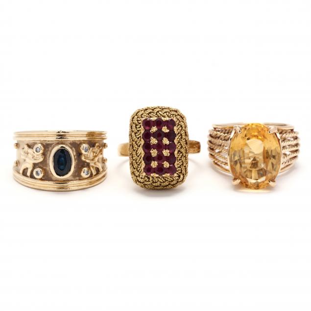 three-gold-and-gem-set-rings