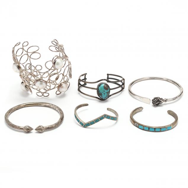 six-silver-cuff-bracelets