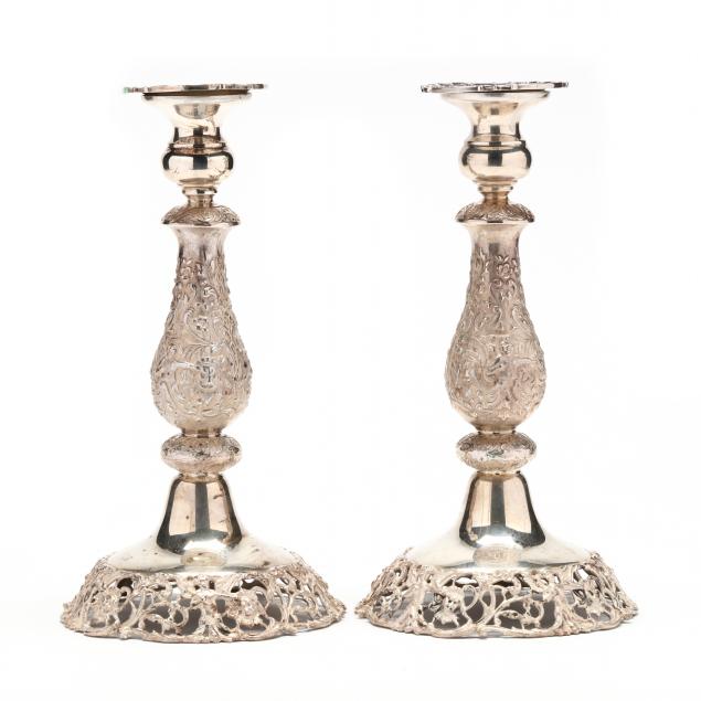 a-pair-of-american-sterling-silver-figural-candlesticks