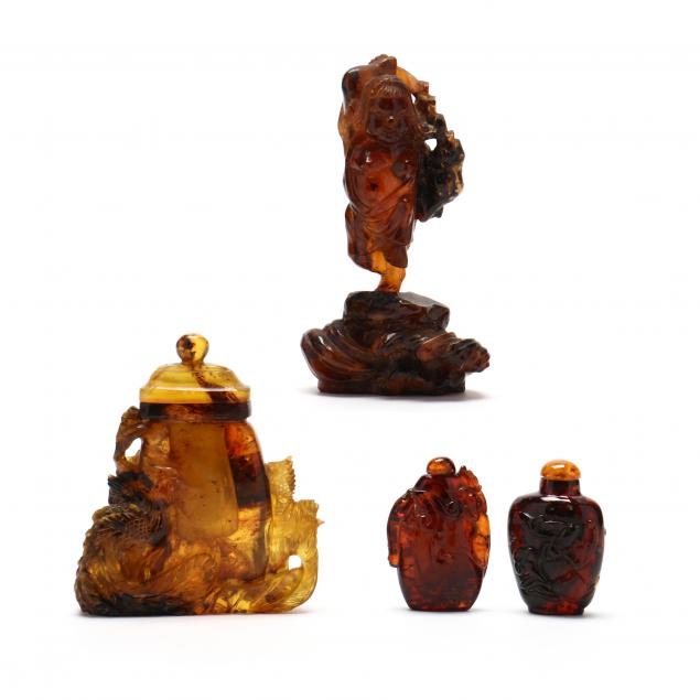 four-chinese-carved-amber-items-including-snuff-bottles
