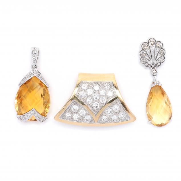 three-gold-and-gem-set-pendants