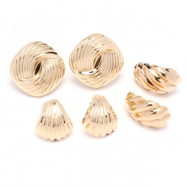 three-pairs-of-gold-earrings