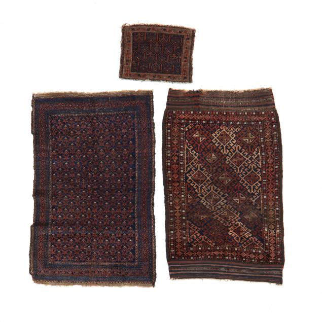two-baluch-area-rugs-and-one-tiny-rug-or-bag-face