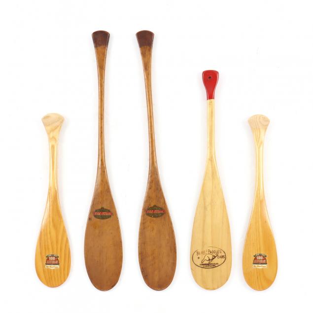 four-old-town-canoe-and-one-beaver-brand-salesmen-paddles