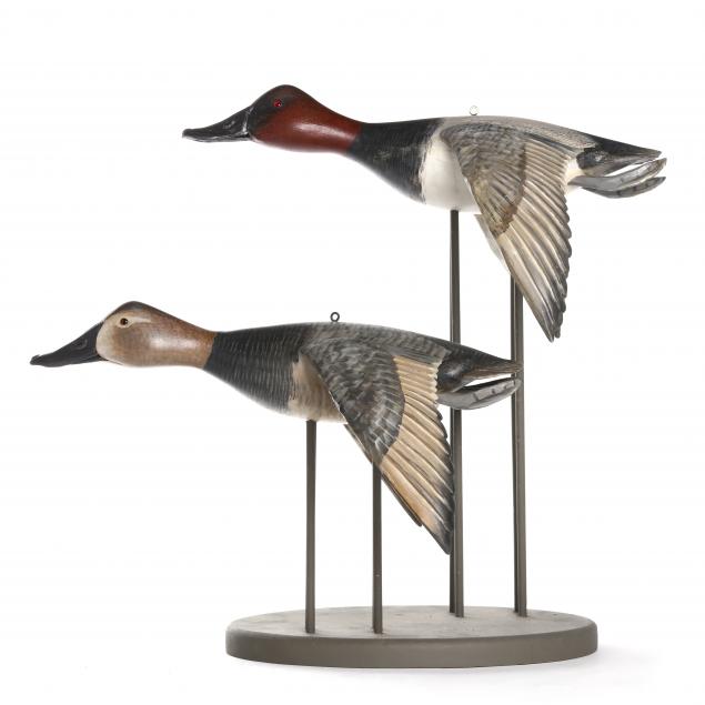 mike-borrett-wi-pair-of-flying-canvasbacks-on-custom-stand
