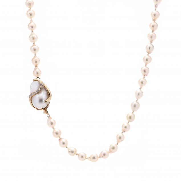 pearl-necklace-with-gold-pearl-and-diamond-clasp