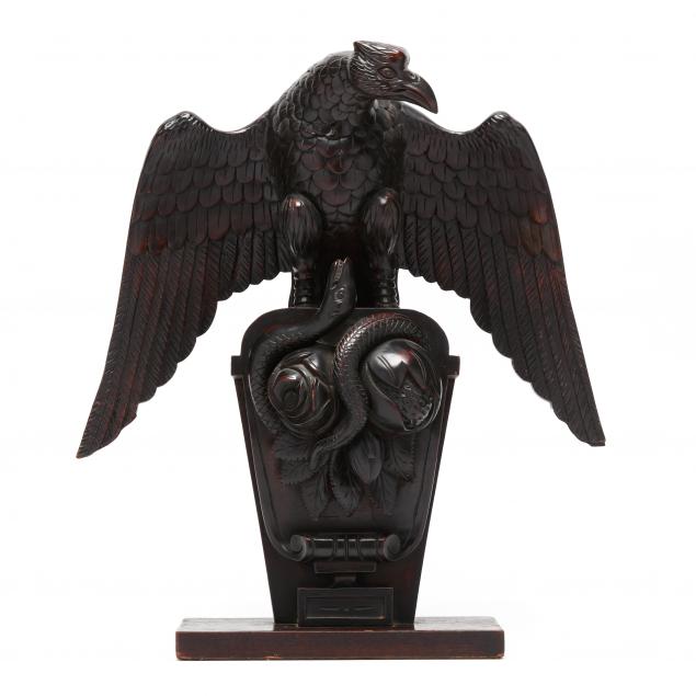 an-unusual-allegorical-carving-figuring-eagle-and-serpent