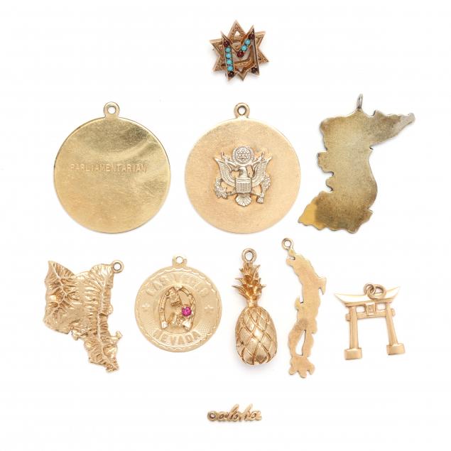 eight-gold-charms-and-a-sterling-silver-charm