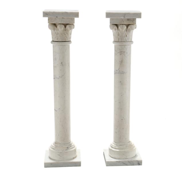 pair-of-classical-style-carved-marble-pedestals