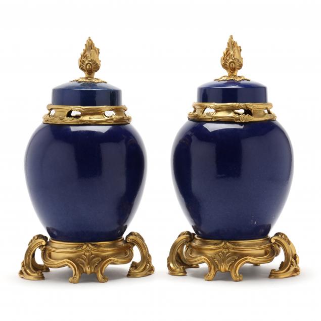 a-pair-of-french-ormolu-mounted-blue-porcelain-urns-with-covers