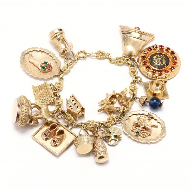 Gold Charm Bracelet with Fifteen Charms (Lot 1014 - Fine Jewelry ...