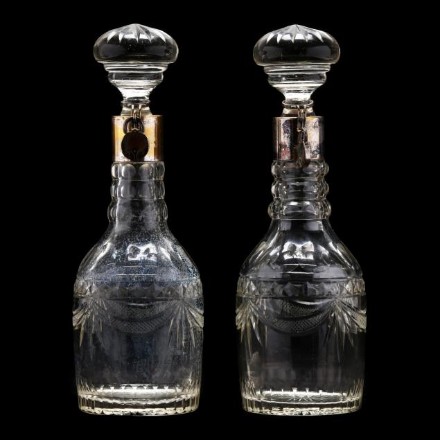 pair-of-cut-crystal-decanters-with-silver-plated-mounts-and-locks