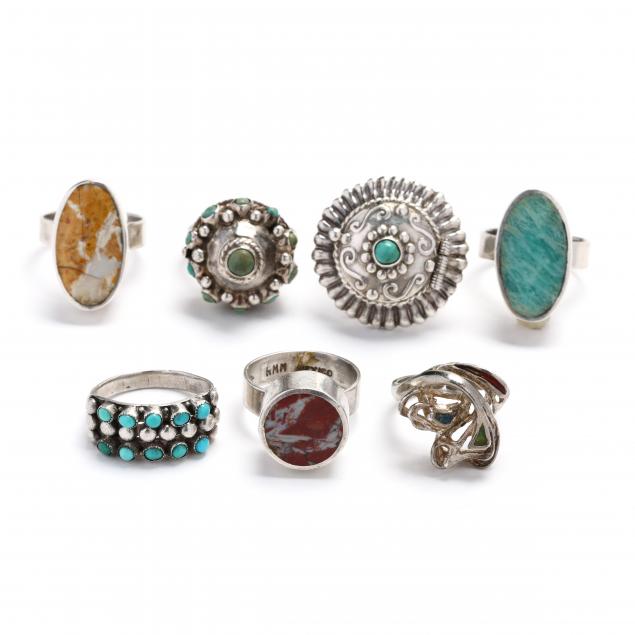 six-silver-and-gem-set-rings-and-one-silver-and-enameled-ring