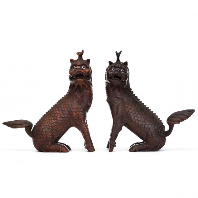 a-pair-of-carved-wood-chinese-qilin-sculptures