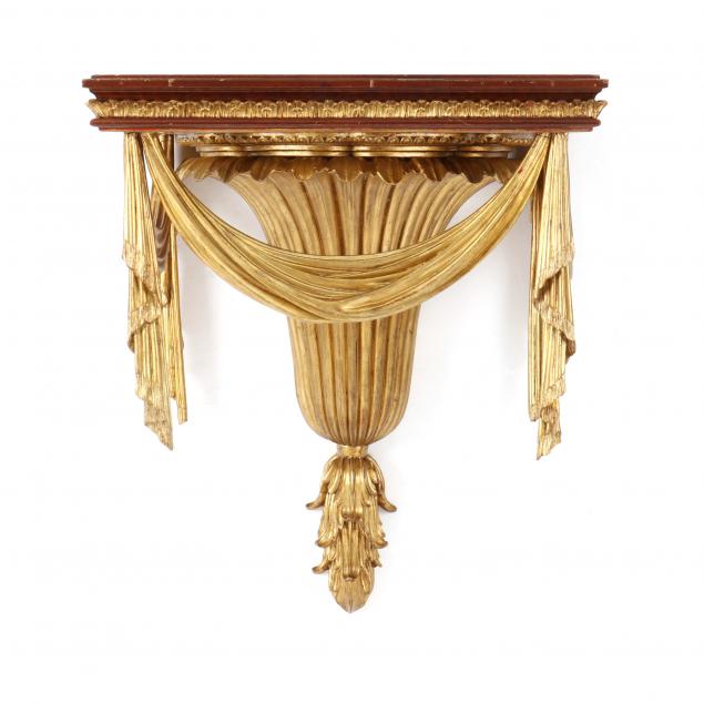 a-regency-style-parcel-gilt-drapery-form-wall-bracket