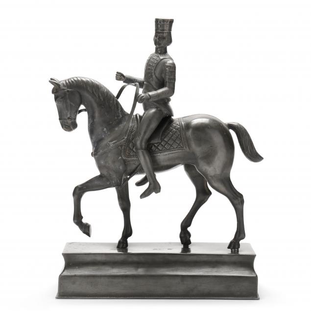 a-continental-pewter-sculpture-of-a-soldier-on-horseback