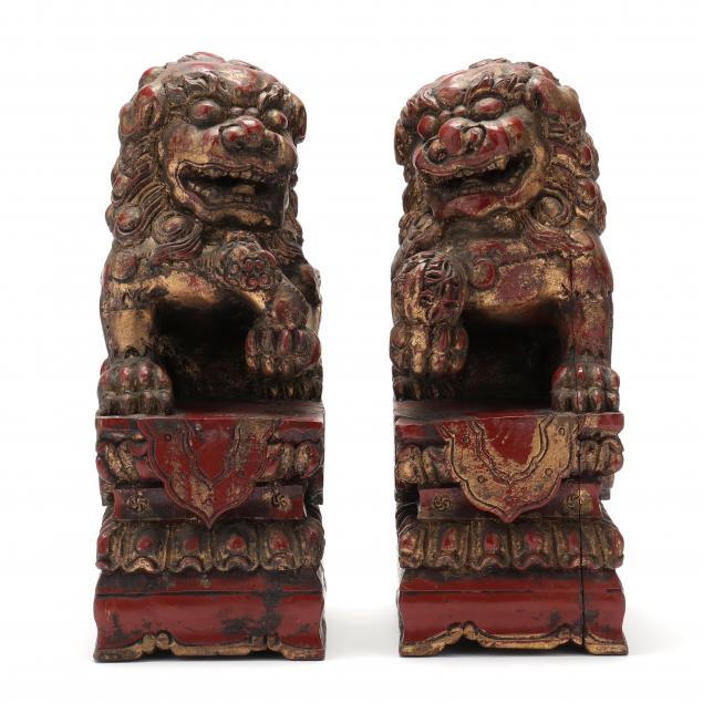 a-pair-of-chinese-carved-and-lacquered-wood-foo-lions